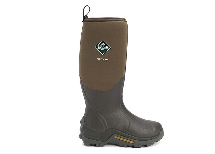A Wetland Muck Boot (in profile) wellington boot in brown.